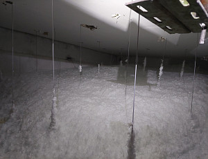 Zateplení stropu bytového domu pomocí foukané izolace